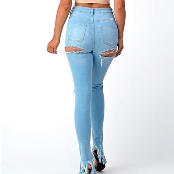 Distressed Denim With Ripped Bell Bottoms - Picture 4 of 8